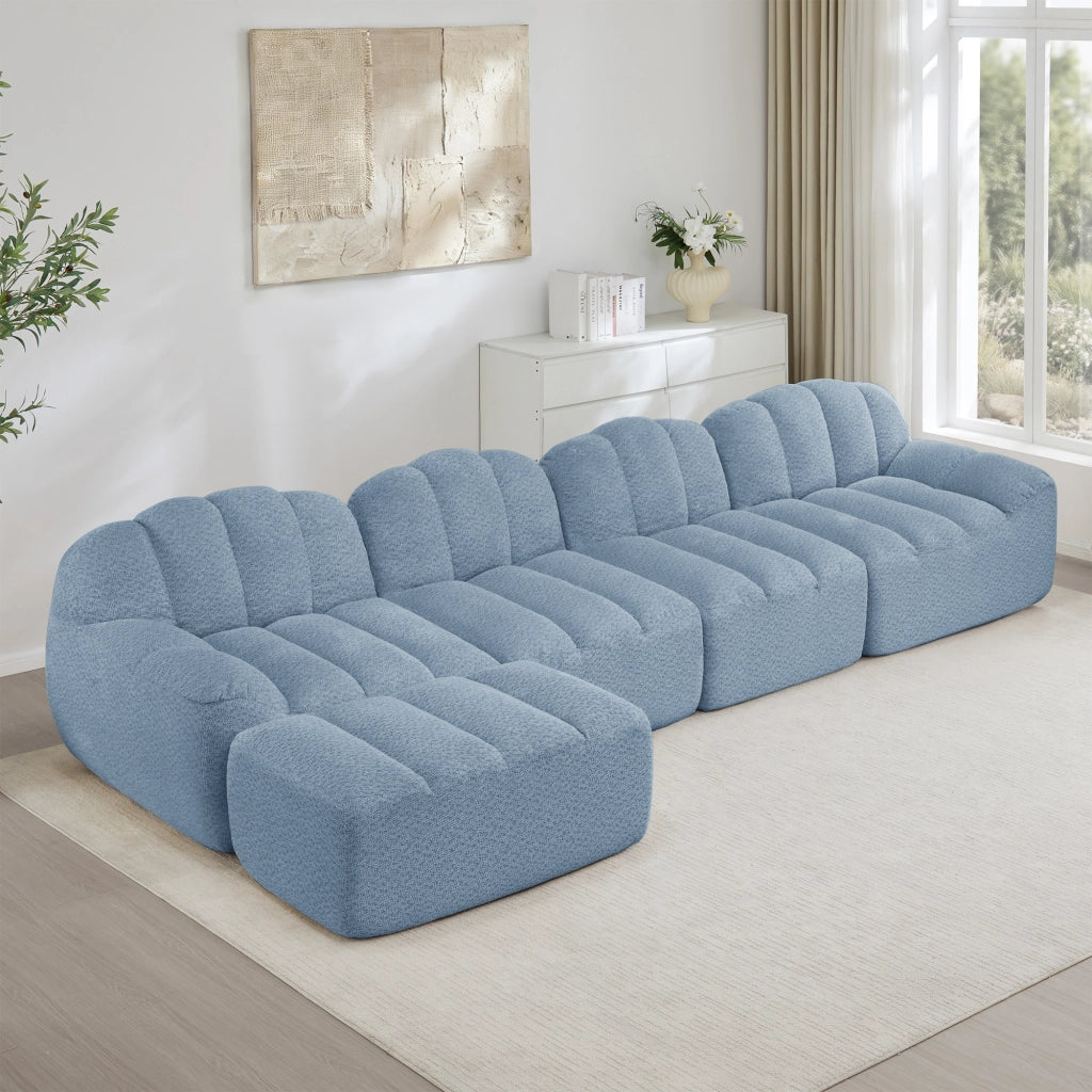 Divano modulare 4 posti con pouf e seduta ampia, schienale ergonomico per soggiorno in fleece granulato blu
