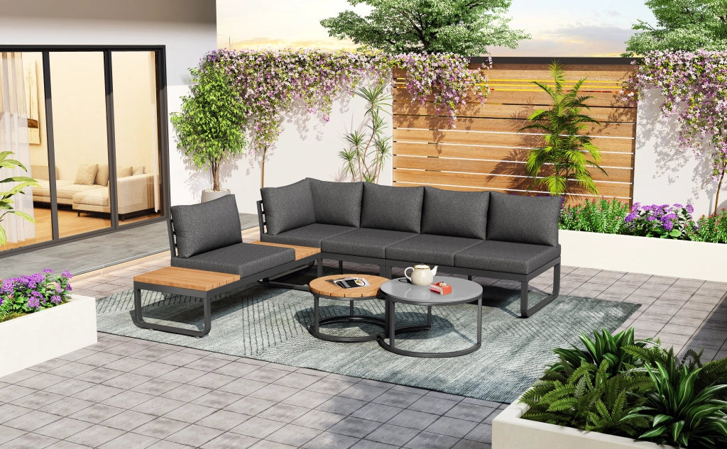 Set mobili giardino 4-5 persone: 2 tavolini impilabili; ferro zincato; cuscini seduta; piedini regolabili; grigio