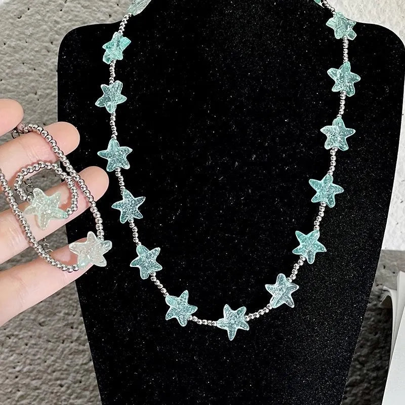 Set di gioielli boh¨¦mien fatti a mano con perline: bracciale, anello e collana.