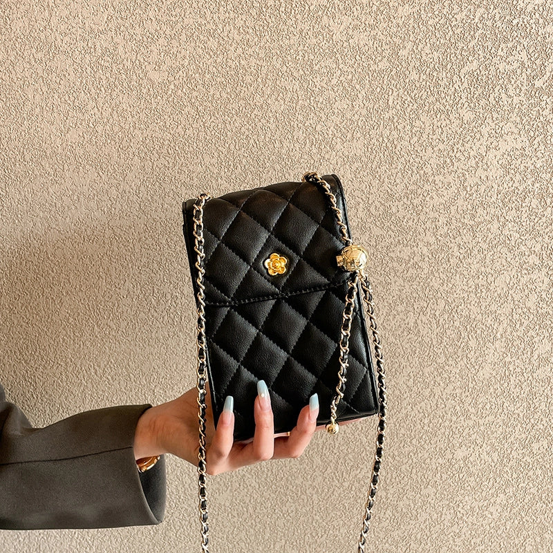 Borsa a tracolla da donna in vera pelle, nera, con catena.