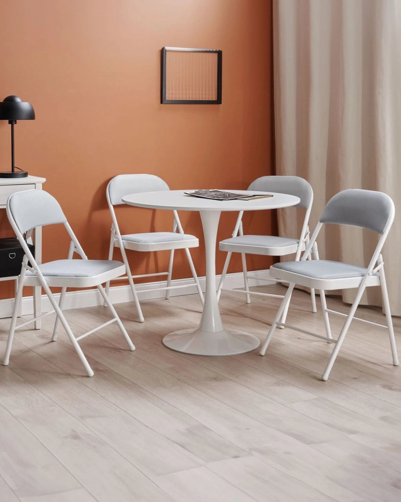 Set di 4 sedie pieghevoli con struttura in metallo Grigio chiaro sedile e schienale imbottiti in tessuto sedili pieghevoli