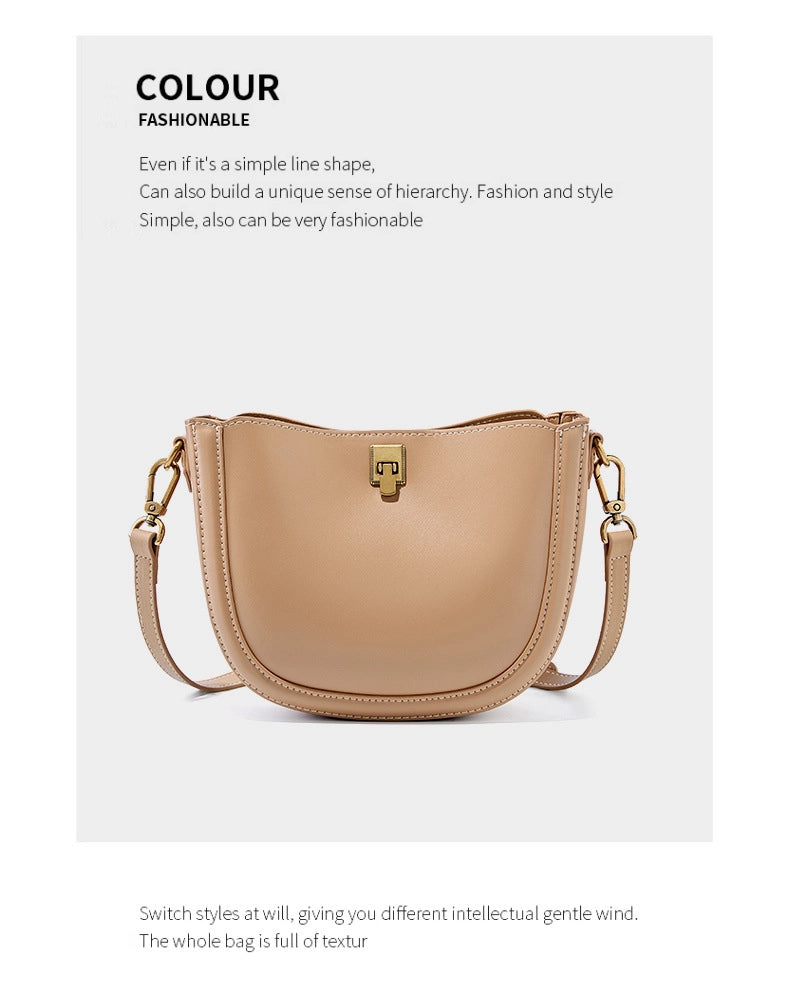 Borsa a mano/a tracolla da donna in pelle di vacchetta Togo, colore bronzo.