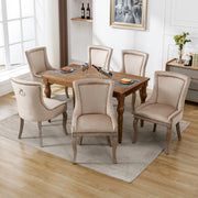 Sedia da pranzo imbottita, schienale curvo e borchie, gambe in legno, in velluto beige