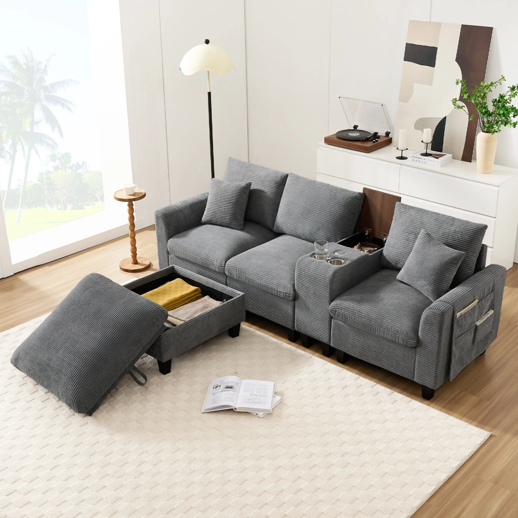 Divano angolare modulare in corduroy con consolle centrale porte USB portabicchieri e cuscini grigio per soggiorno