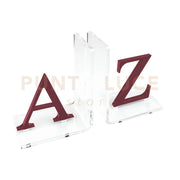 REGGILIBRO LETTERS IN CRISTALLO ACRILICO TRASPARENTE E VINACCIA