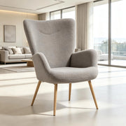 Poltrona lounge in tessuto bouclé grigio con schienale alto e braccioli, 71x74x97,5 cm