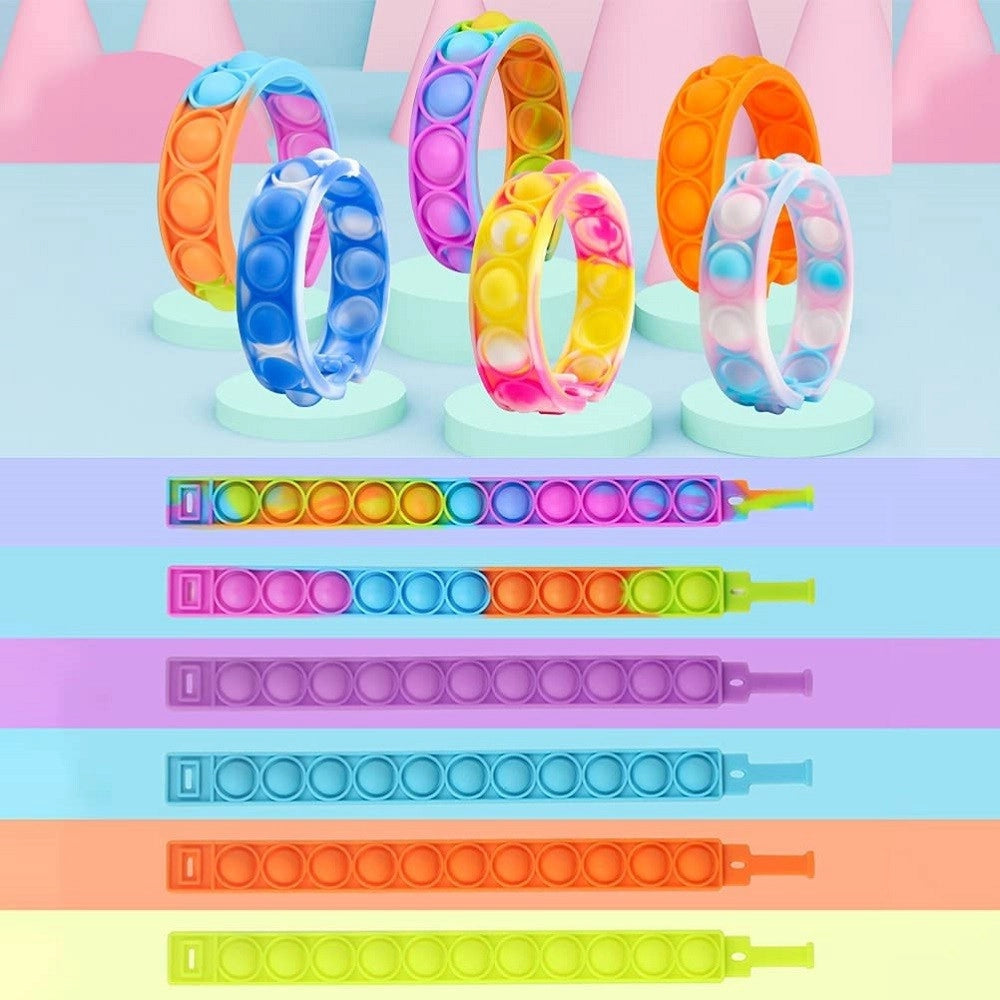 Trade Shop - 6 Braccialetti Antistress Arcobaleno Bolle Aria In Silicone Gioco Bambini Adulti -