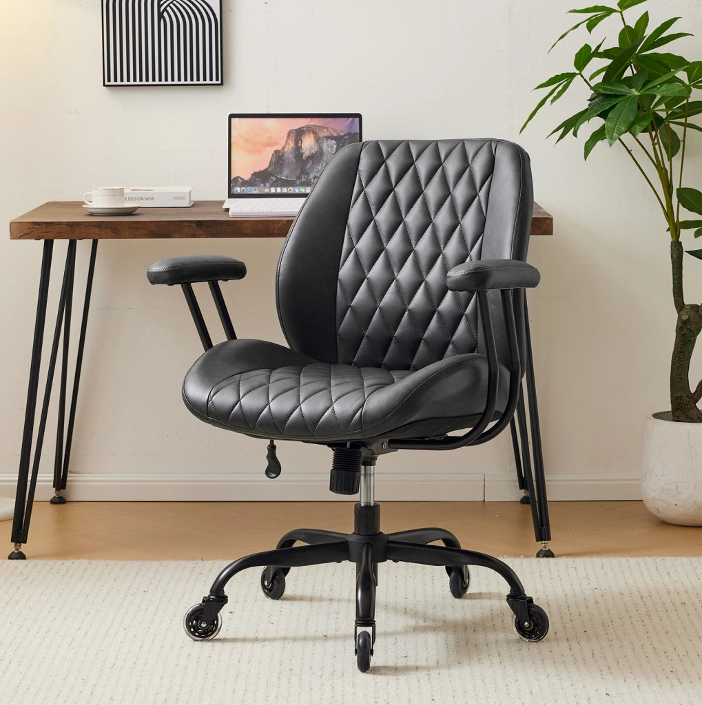 Sedia ergonomica da ufficio in pelle nera con braccioli removibili e ruote silenziose