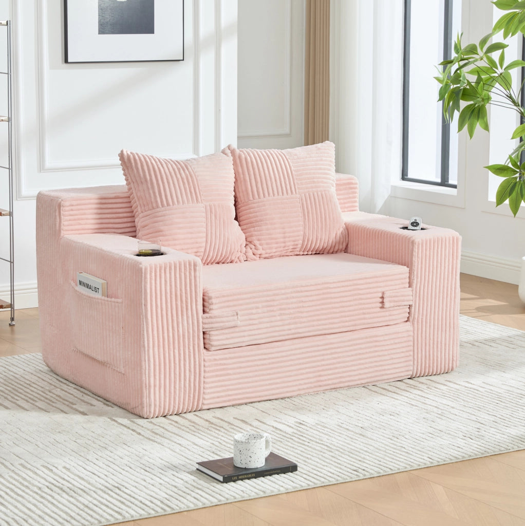 Divano pouf in velluto a coste rosa con tasche laterali e 2 cuscini; 151 × 133 × 64 cm