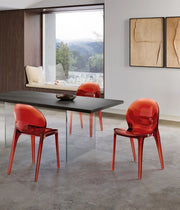 Sedia di design Ruby in policarbonato monoblocco colore rosso - Stile moderno, seduta ergonomica e trasparenze lucide per interni