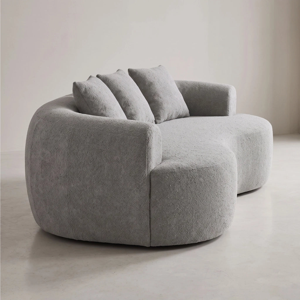Yoko - Divano Angolare Curvo 200x62x105 a Compressione in Tessuto Bouclé Grigio