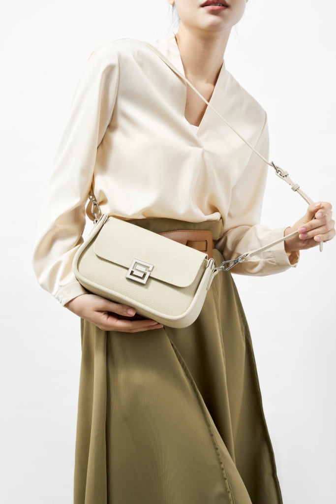 Borsa a tracolla da donna TOGO in vera pelle, colore bianco.