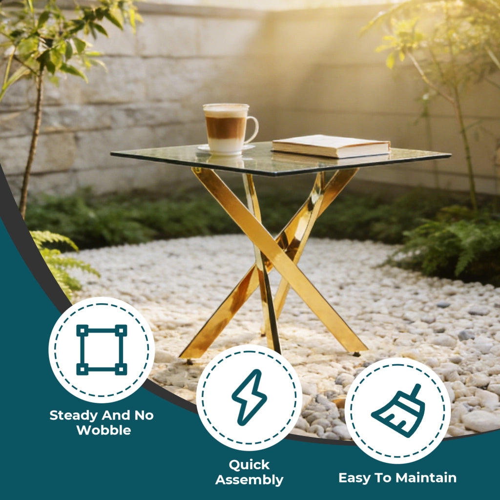 Tavolo da pranzo quadrato con piano in vetro e gambe incrociate in metallo; Stile Moderno; 80×80×75 cm; Oro