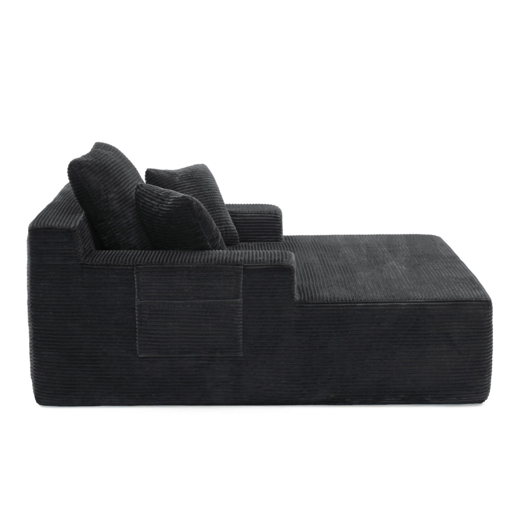 Divano compatto in corduroy nero con tasche laterali e cuscini; stile retr貌