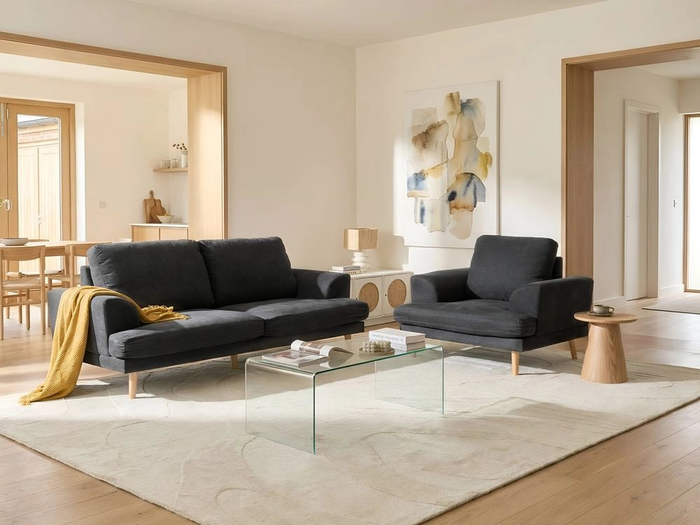Set da salotto a 4 posti con divano in tessuto e poltrona braccioli svasati in stile moderno nero