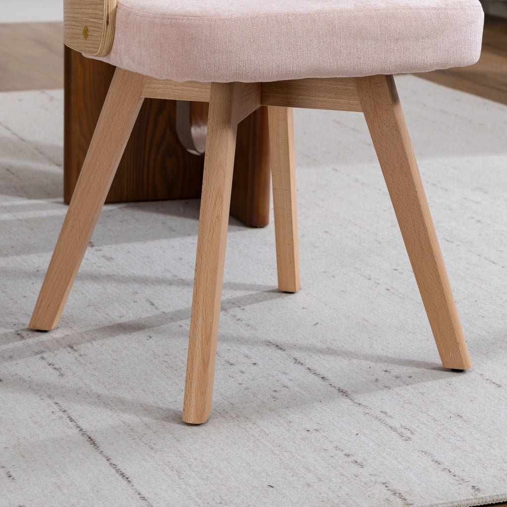 Sedia da pranzo girevole rosa in lino con gambe in faggio e schienale ergonomico imbottito