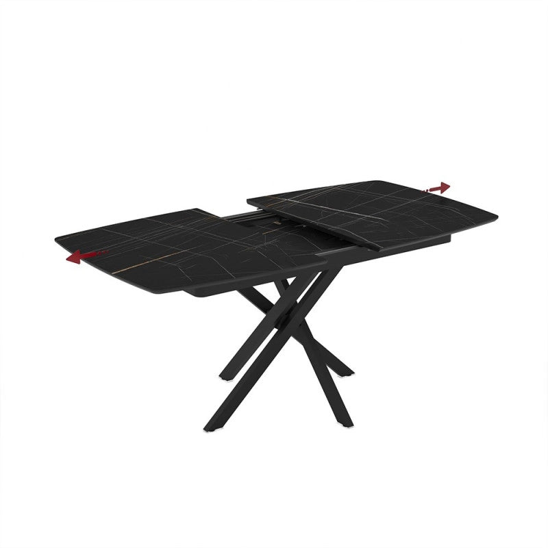 Tavolo allungabile Filis con piano effetto marmo nero con dettagli oro matt e gambe in metallo nero