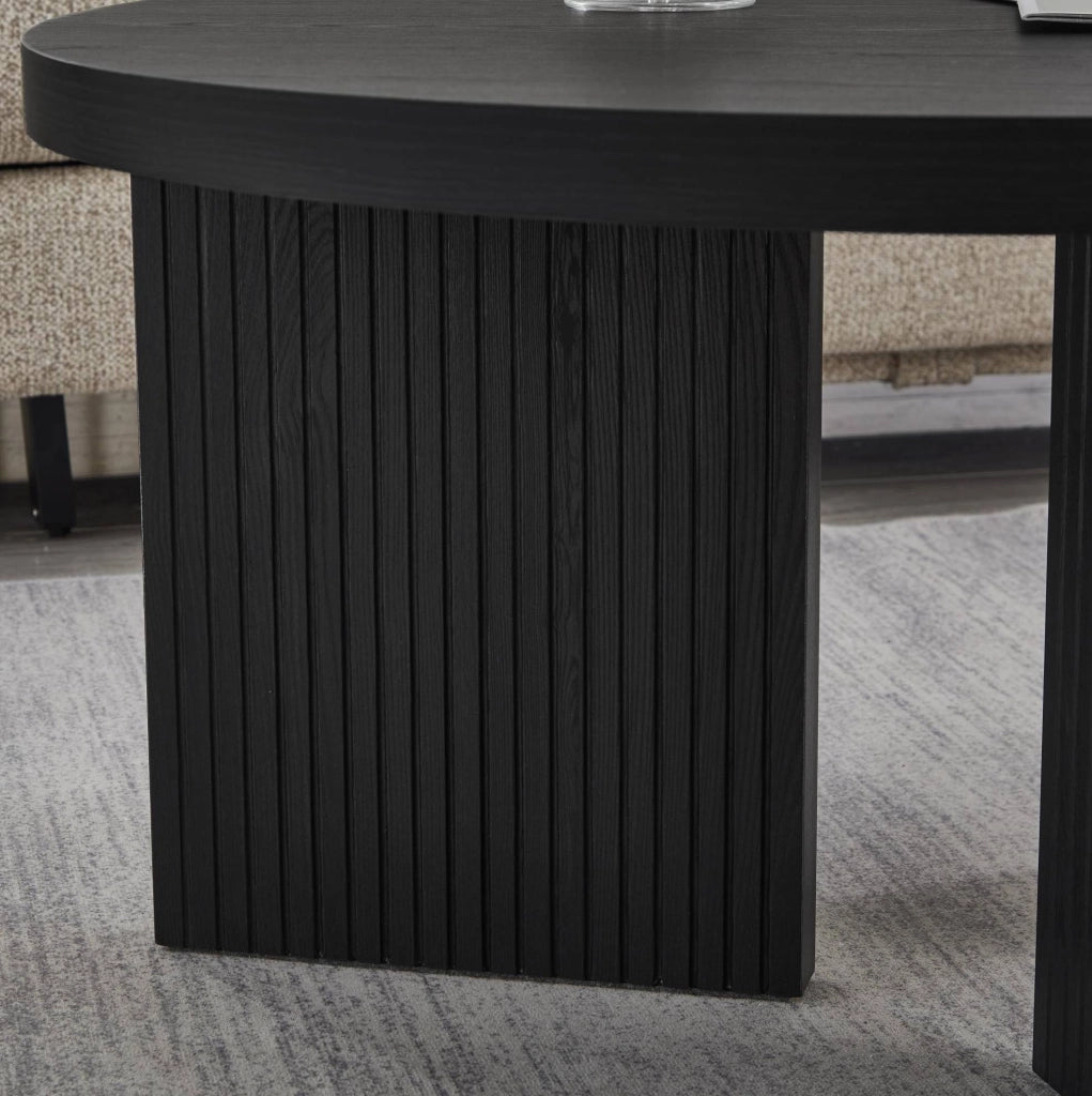 Tavolino da caffè rotondo in MDF nero con design scanalato