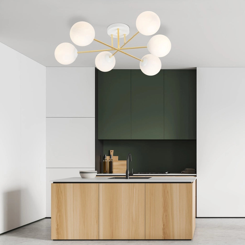 Lampada a sospensione Magnum con struttura oro e sfere in vetro