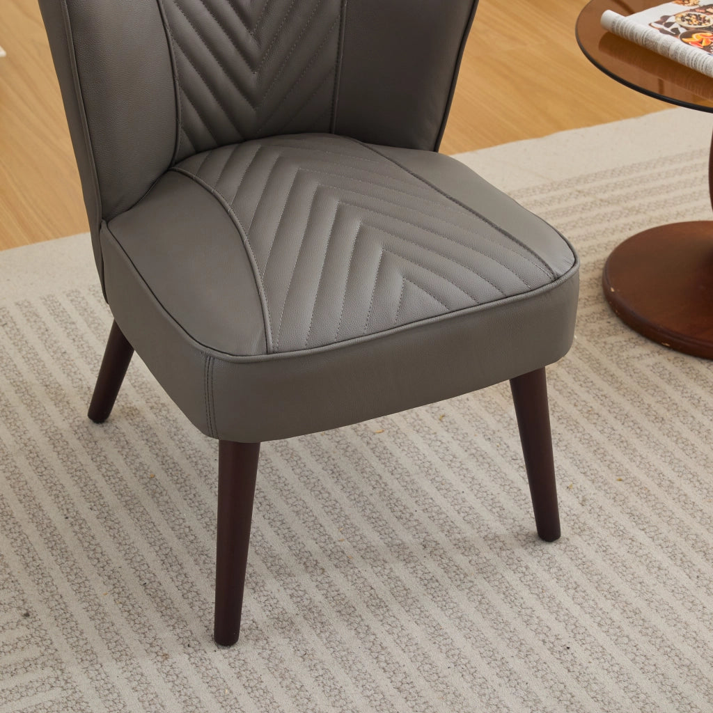 Poltrona senza braccioli in pelle con cuciture diagonali e base in legno - grigio