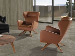 Poltrona girevole in ecopelle marrone