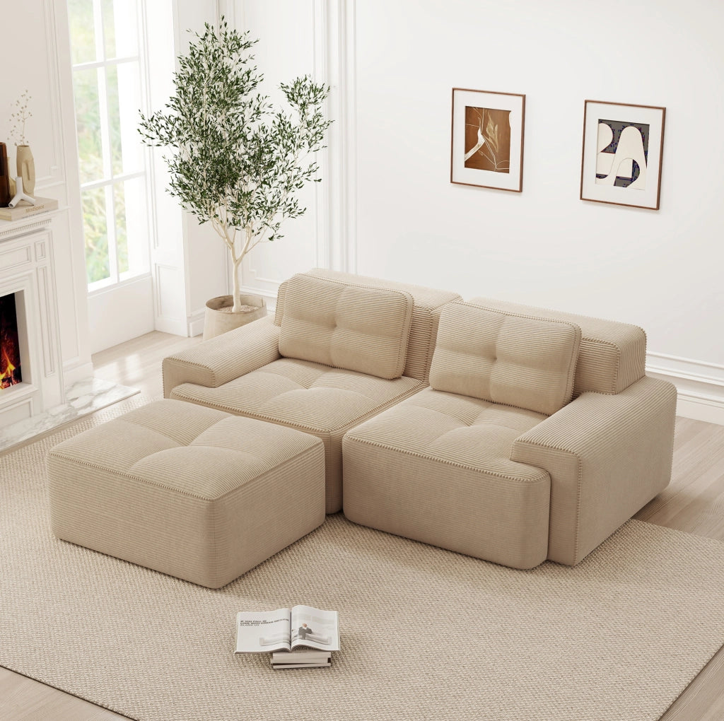 Divano modulare con seduta profonda; schienale curvo in corduroy beige