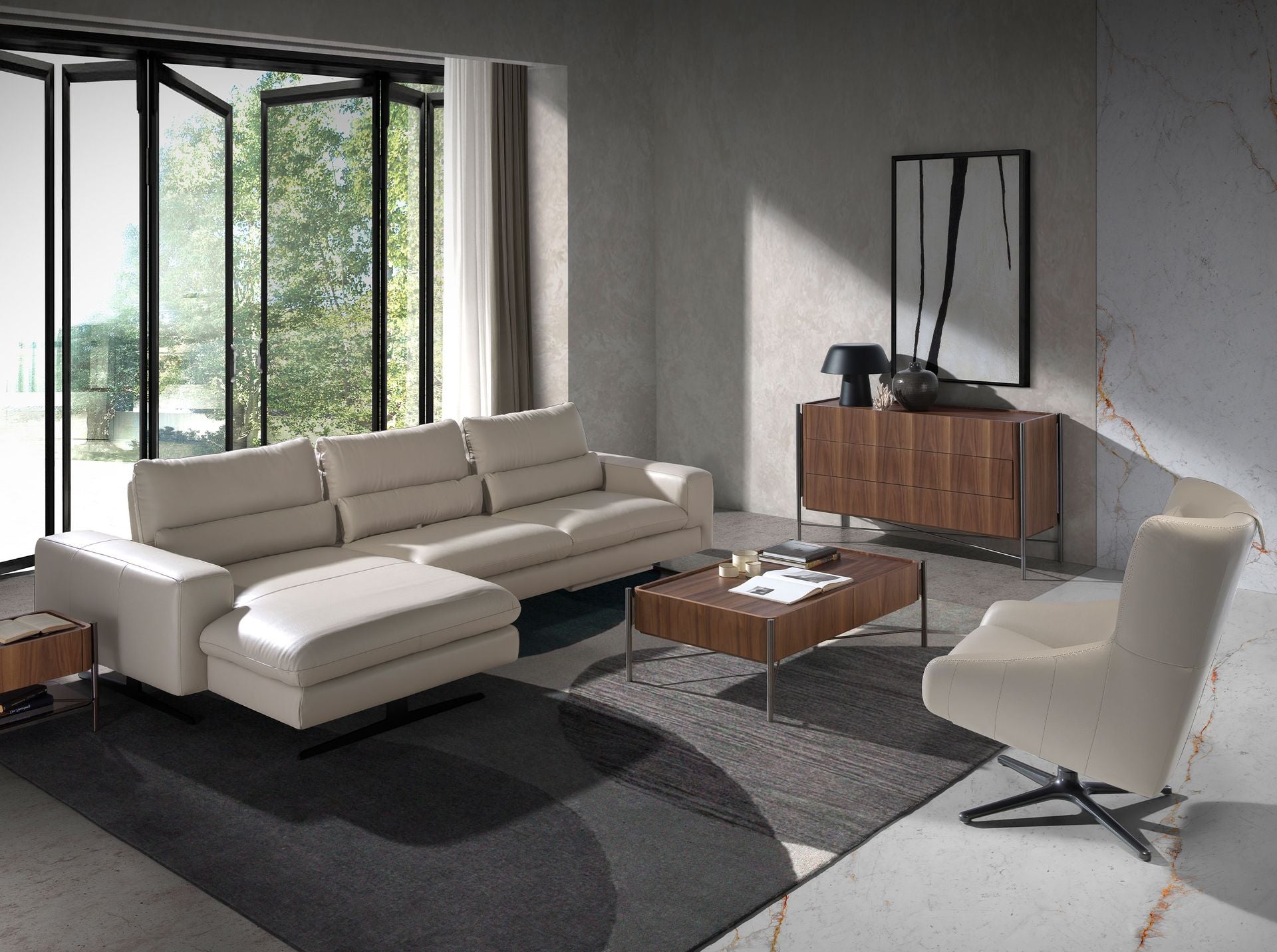 Poltrona girevole in pelle grigio taupe