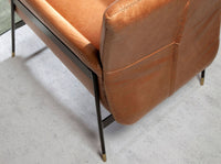 Poltrona girevole in pelle marrone