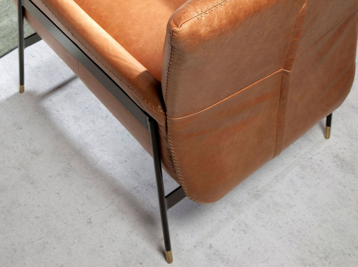 Poltrona girevole in pelle marrone