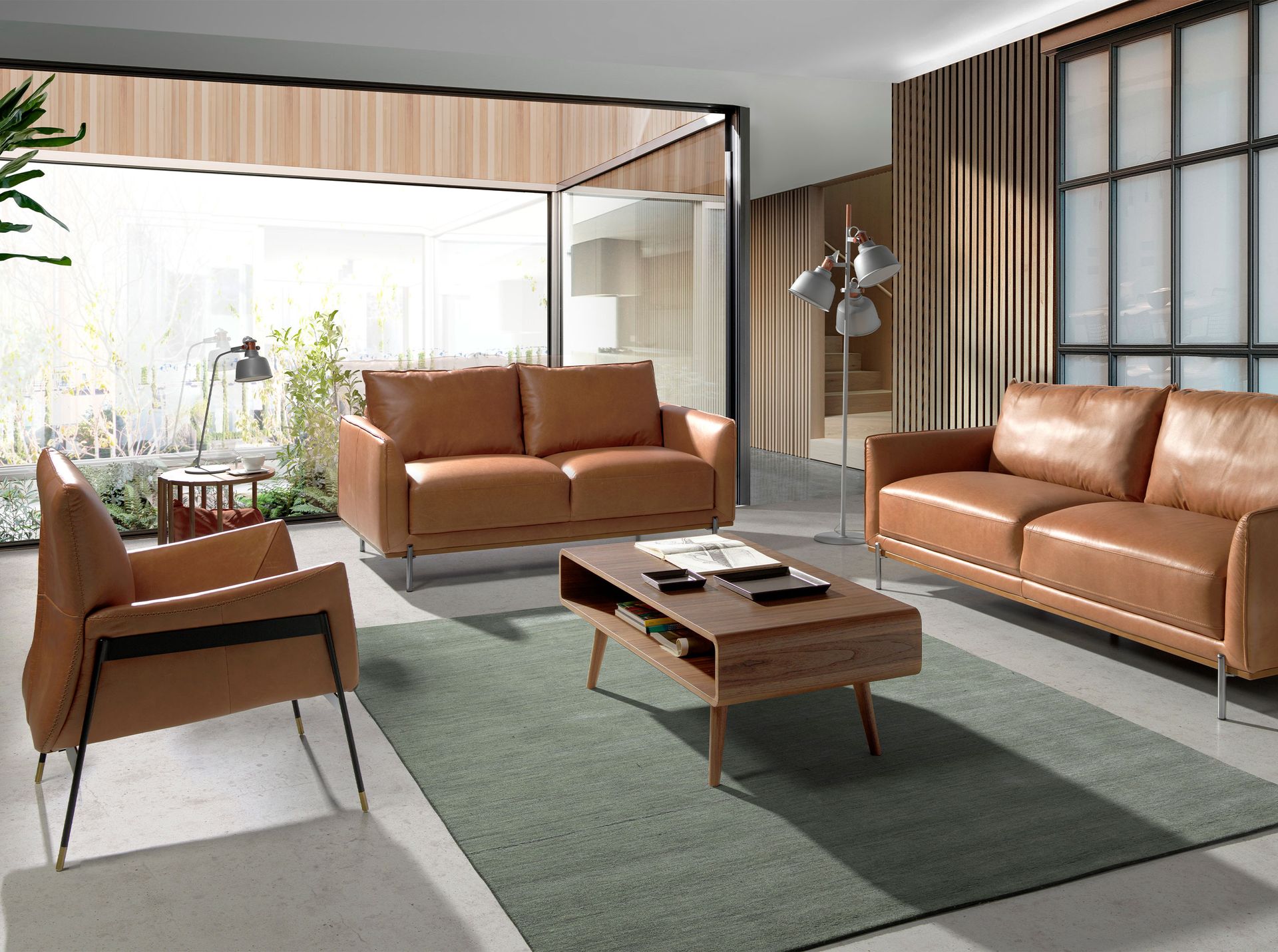 Poltrona girevole in pelle marrone