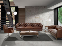 Poltrona girevole in pelle marrone cognac