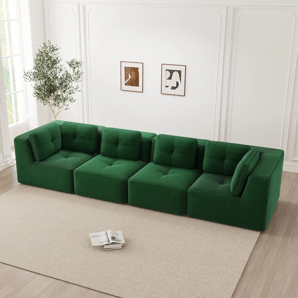 Divano angolare modulare senza montaggio con moduli flessibili seduta profonda e braccioli in velluto a coste verde