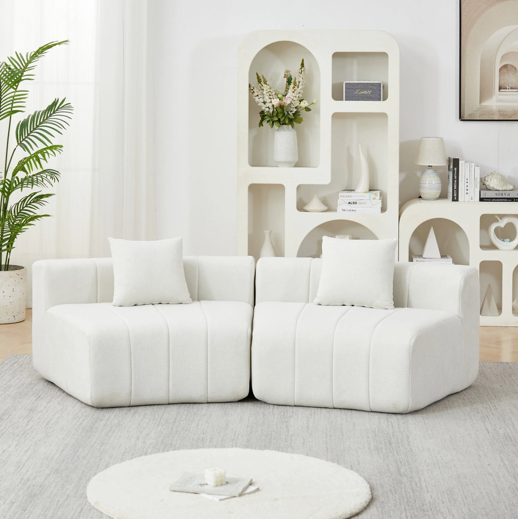 Modulo divano in chenille con forma curva e due cuscini per soggiorno e ufficio