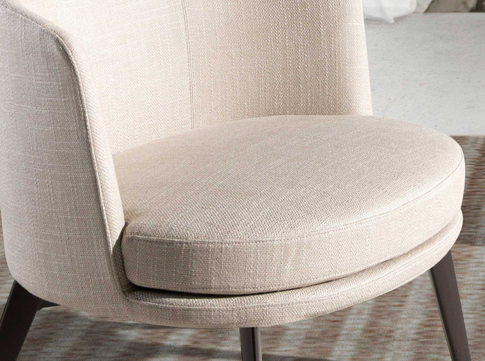 Poltrona in tessuto crema