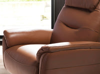 Poltrona girevole in pelle marrone