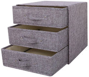 Organizzatore per abbigliamento a 3 cassetti in legno scuro.