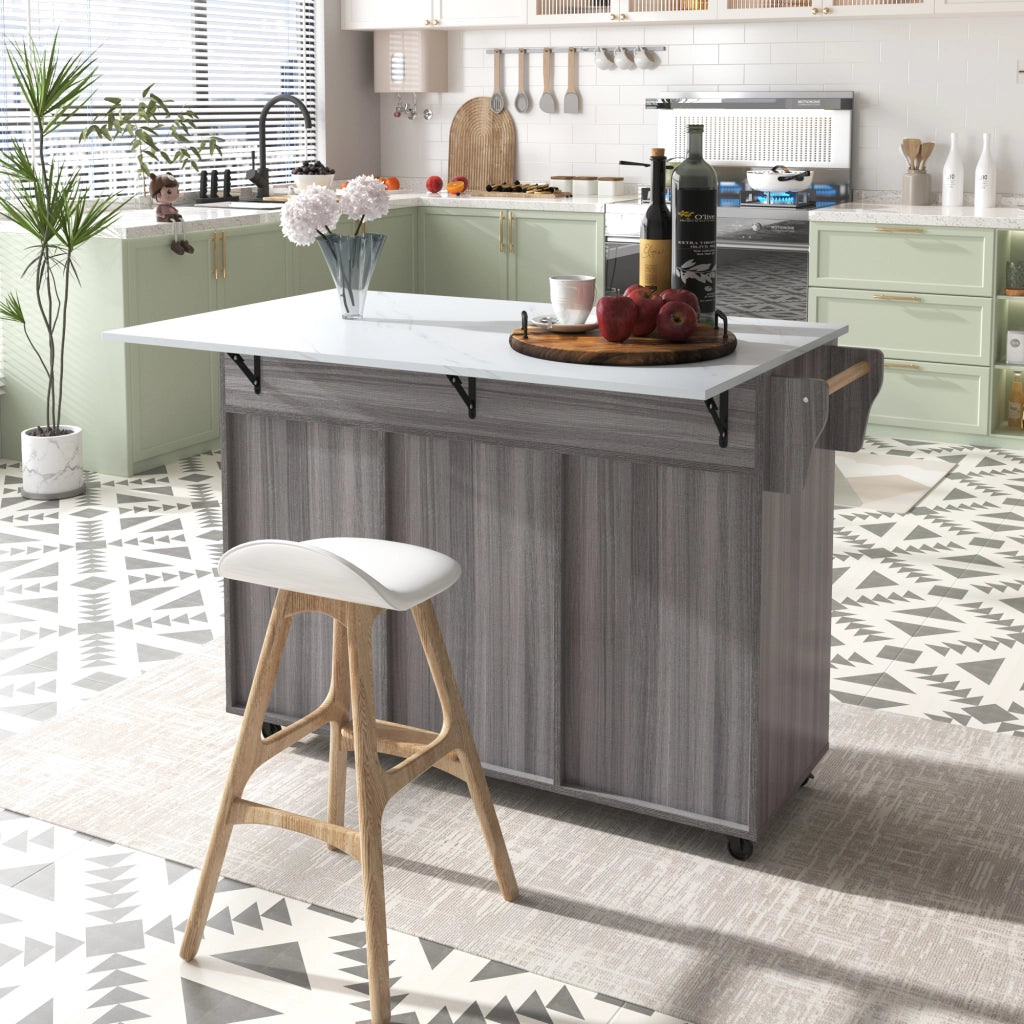 Isola da Cucina Mobile 129x46/71x91;5 cm Grigio con Piano Effetto Marmo; 2 Cassetti; Ripiani e Ruote