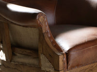 Poltrona in pelle marrone cognac