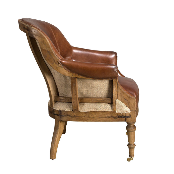 Poltrona in pelle marrone cognac