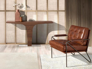 Poltrona in pelle marrone cognac