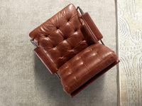 Poltrona in pelle marrone cognac