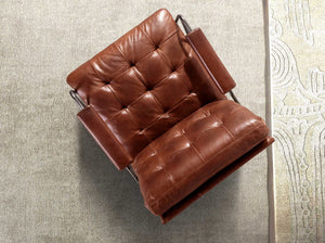 Poltrona in pelle marrone cognac