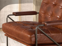 Poltrona in pelle marrone cognac