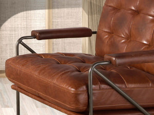 Poltrona in pelle marrone cognac