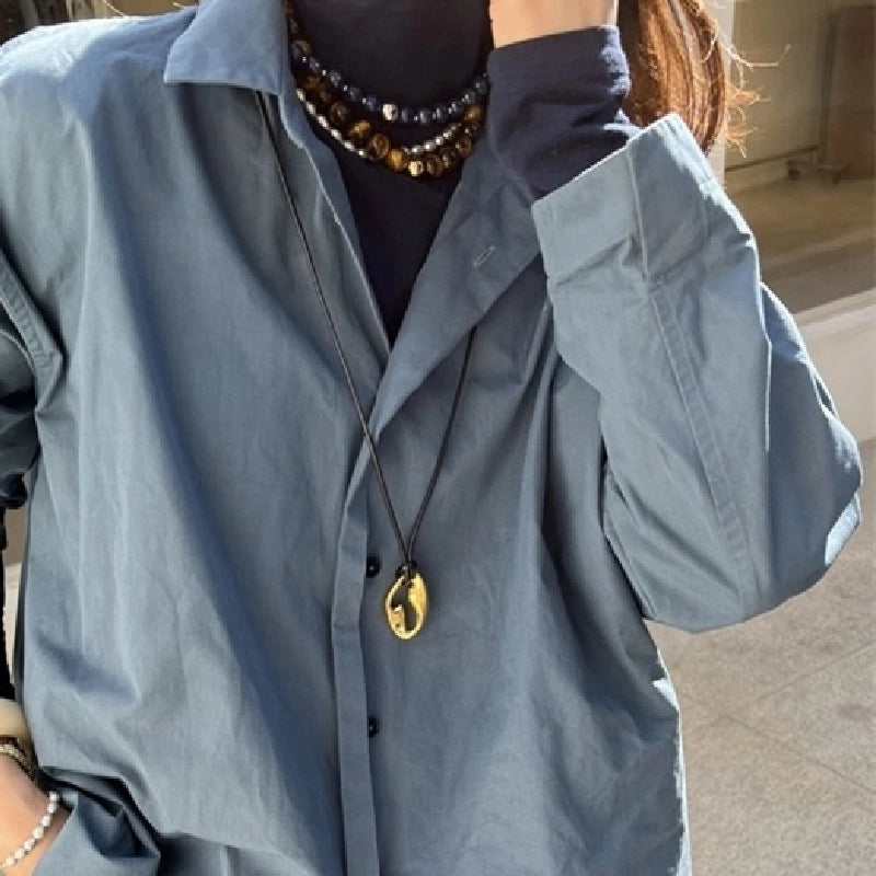 Collana da vita Maillard in metallo cavo dorato con cordino in pelle intrecciato e annodato - Semplice ed elegante, ideale per l'autunno/inverno.