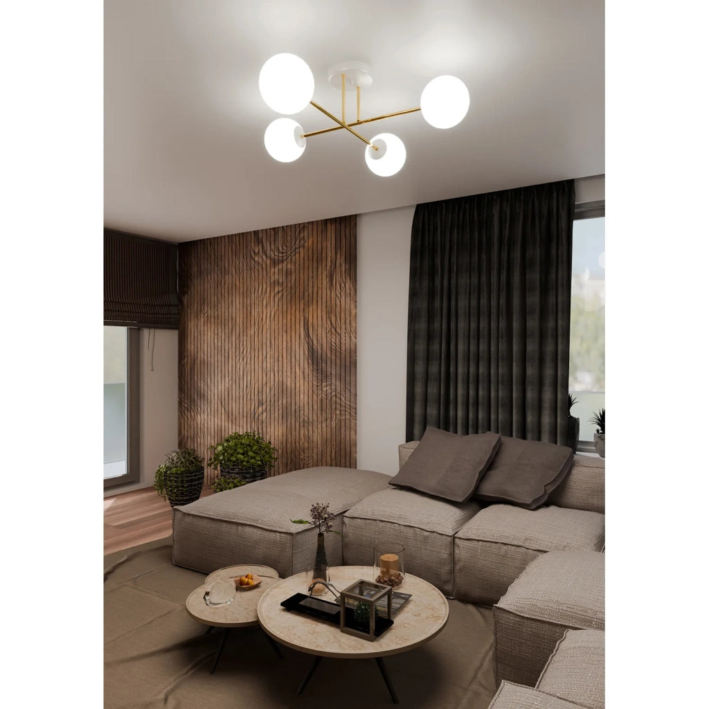 Plafoniera Moderna Magnium 4 Luci In Acciao Oro E Sfere In Vetro Bianco