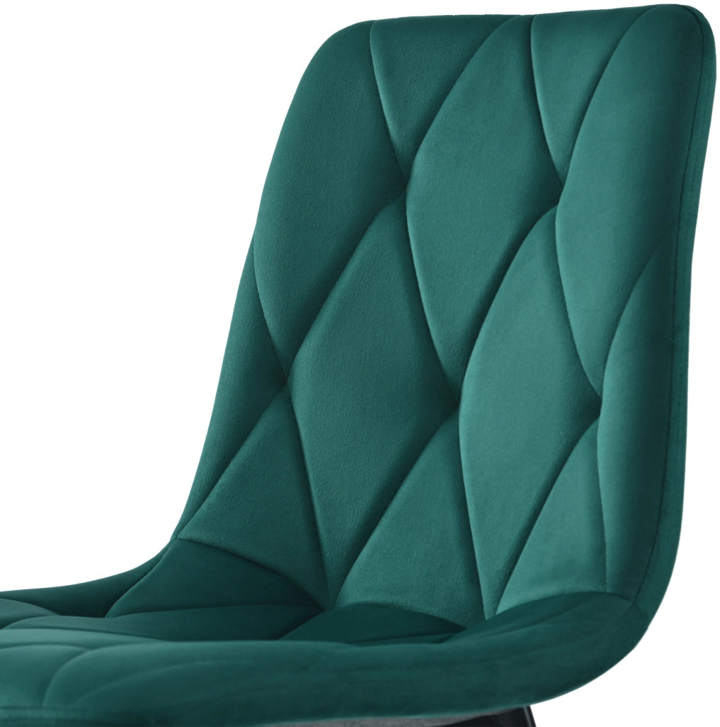 Set di 4 sedie da pranzo imbottite in velluto verde scuro; struttura in metallo