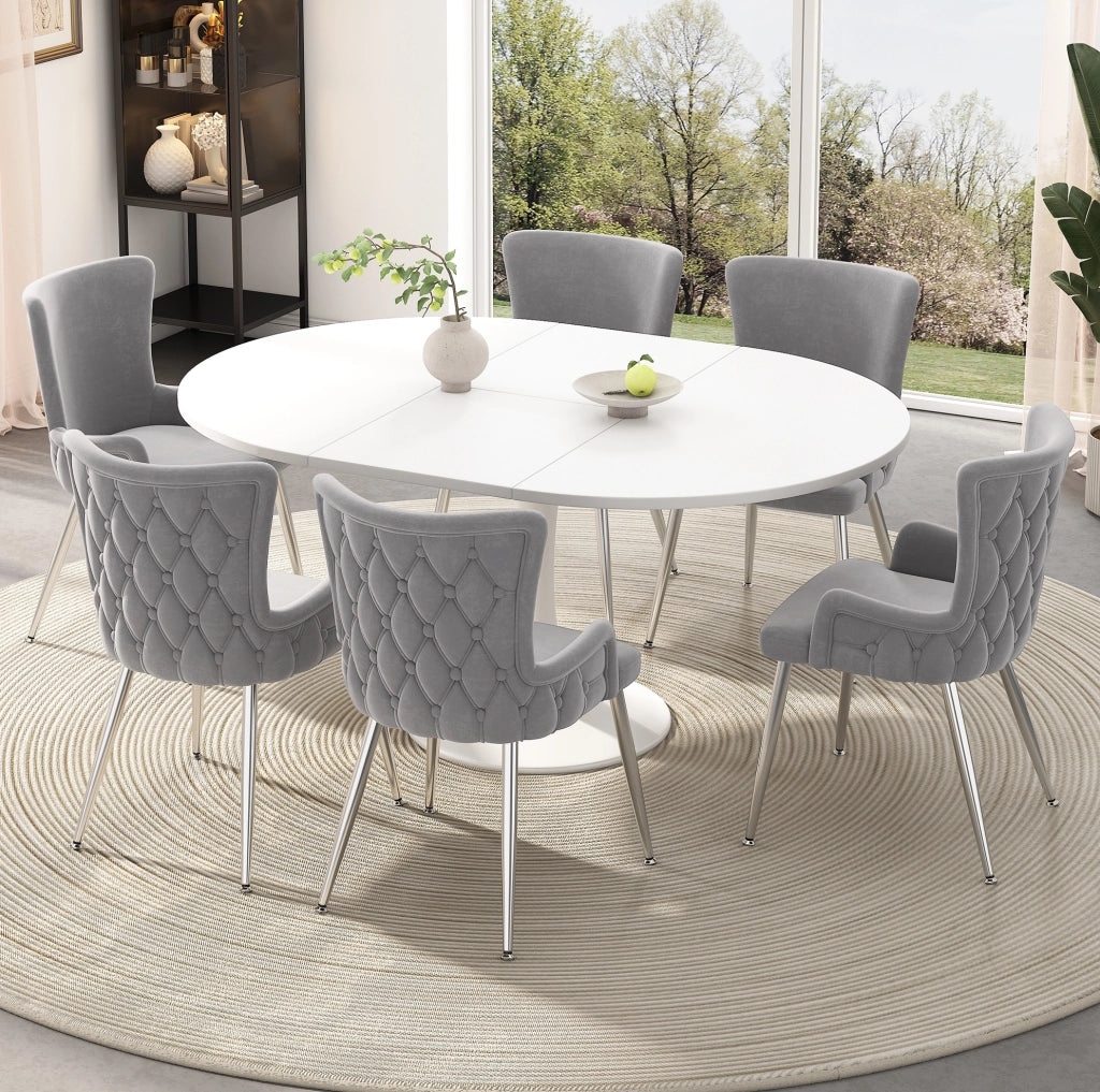 Set di 4 sedie in velluto con gambe in metallo; design moderno; grigio e argento