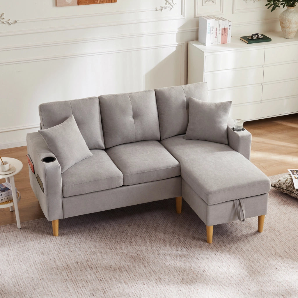 Divano angolare a L 3 posti con chaise longue; contenitore; grigio chiaro