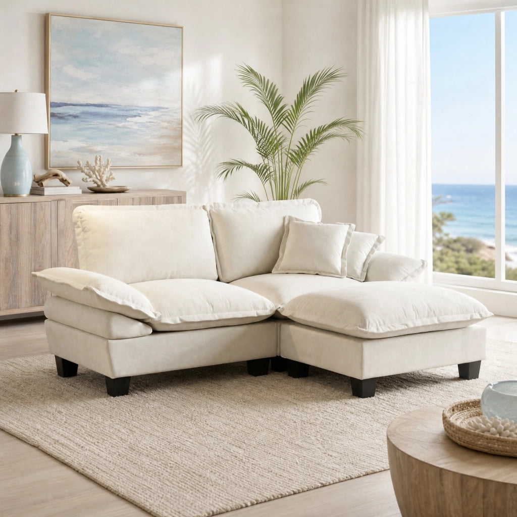 Divano modulare con ottomano mobile e cuscini in chenille beige